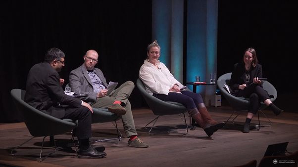 Eran Tal, Arfon Smith, Anna Scaife and Emily Sullivan seated on stage during the Technomoral Conversations event. They are mid-conversation. 