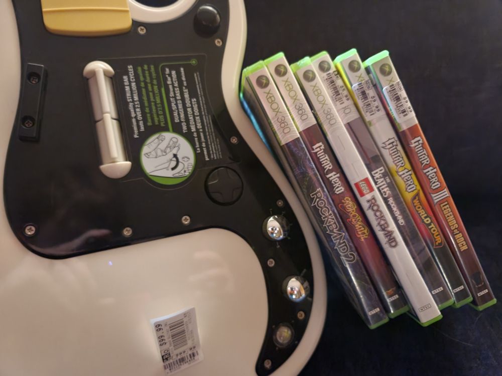 A Rock Band guitar controller and a bunch of games.