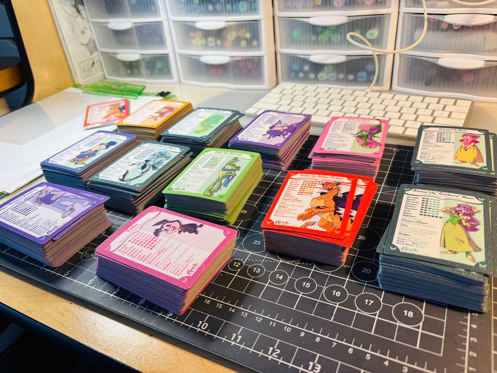 A photo of trading cards #harpygee #tradingcards #webcomics 