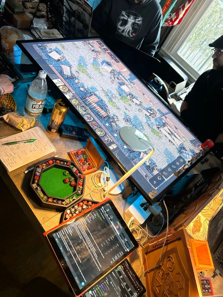 Large display with a map, tablets dice and snacks