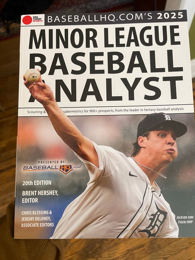 Cover of the 2025 Minor League Baseball Analyst, with a picture of Tigers pitcher Jackson Jobe. 