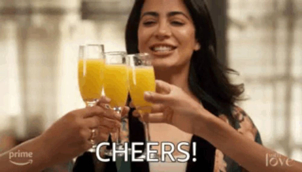 a woman is toasting with three glasses of orange juice and the words cheers !