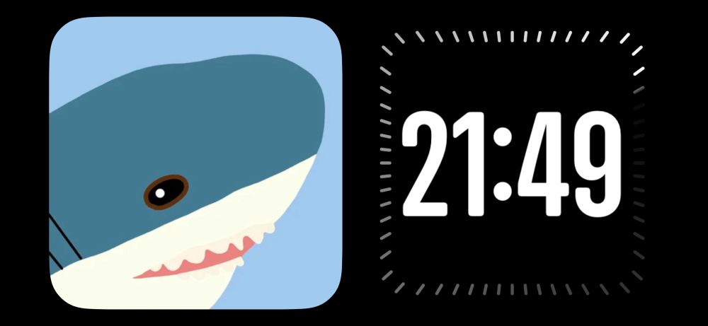 a screenshot of the iphone’s “standby” feature, on the left side is a drawing of a blahaj, on the right is a digital clock.