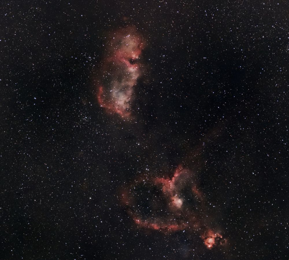 The heart and soul nebula in the constellation Cassiopeia. Their pink-red hydrogen gas form the shape of a newborn baby, and a heart. 