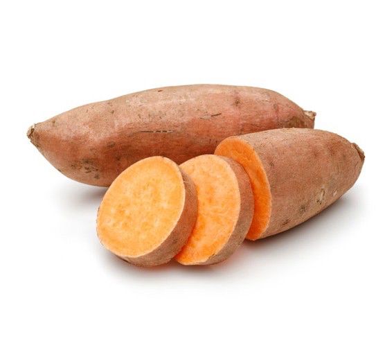 Sliced and whole sweet potatoes