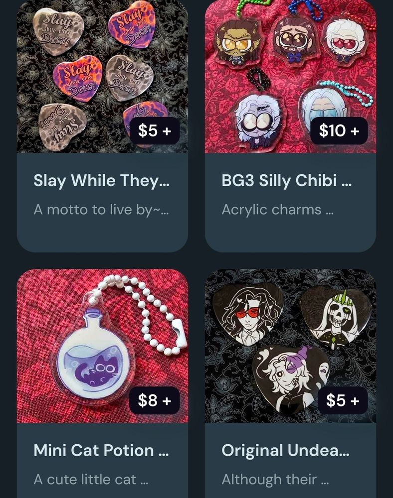 Screenshot of 4 products in my Ko-Fi shop: Slay While They Decay Heart Buttons, BG3 Silly Chibi Acrylic Charms, Mini Cat Potion Acrylic Charms, Original Undead Men Heart Buttons.
