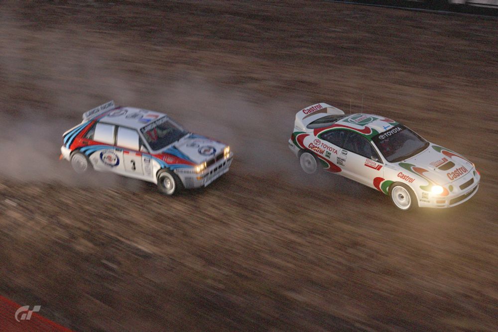 The 1995 Toyota Celica GT-FOUR ST205 in rally configuration, flanked by the 1992 Lancia Delta HF Integrale
