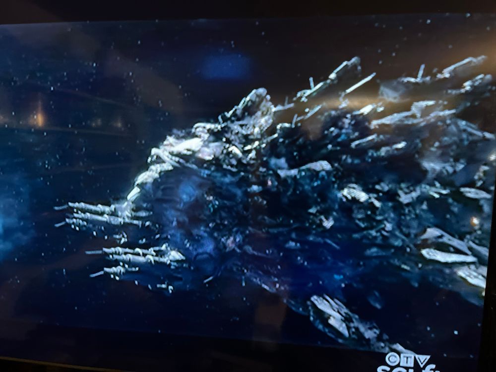 A screen cap of Star Trek episode featuring a pretty obvious giant space whale in a battle suit.