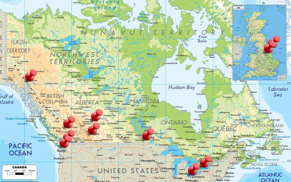 Map of Canada (UK map inset) with push pins in it showing various places lived over the years. 