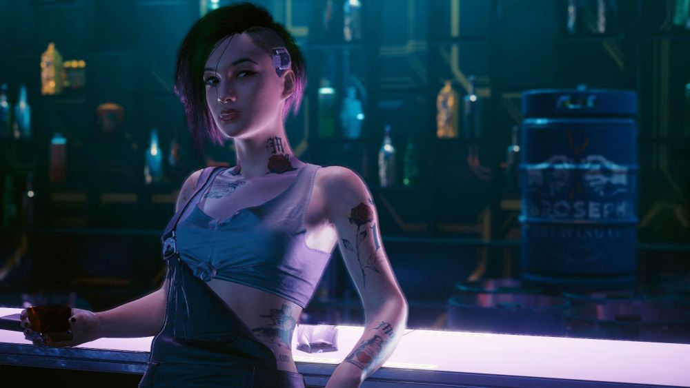 Photo from Cyberpunk 2077
Judy leans up against a bar