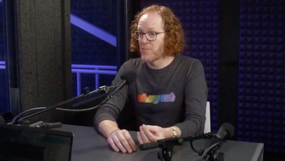 Robby wearing a long-sleeve Oh My Zsh shirt