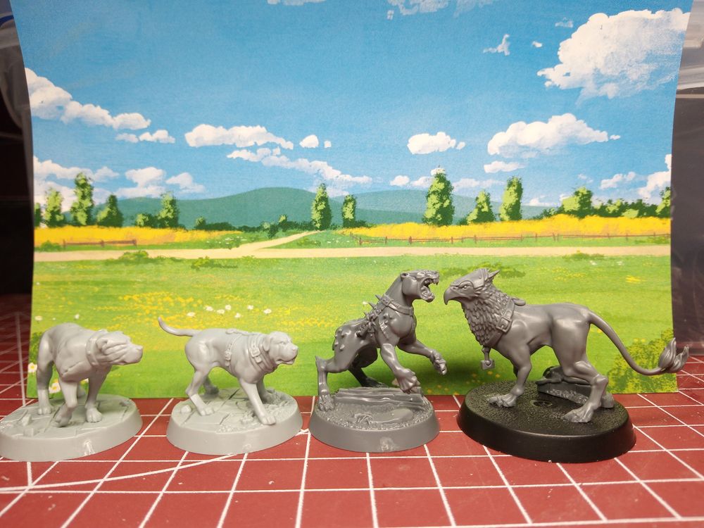4 plastic Warhammer Age of Sigmar miniatures. Two warhounds, a mutated hound and a Gryph-hound.