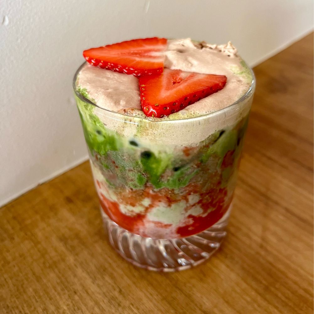 Strawberry matcha latte with chocolate foam