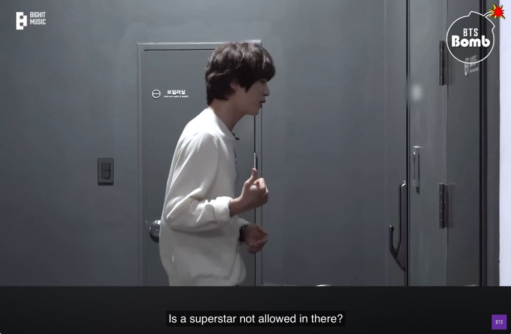 BTS Jin waiting at the door to the set of Young Ji’s “No Prepare” variety show, wondering why no one’s answering and asking “Is a superstar not allowed in there?”