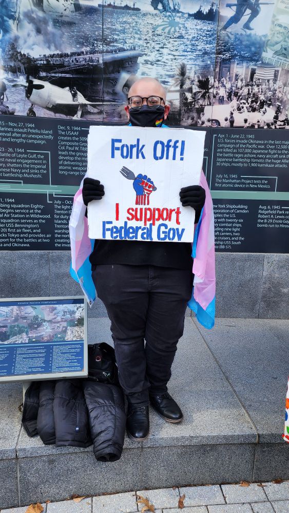 #50501movement protest in Trenton NJ on 2-17-25. A protester is holding up a sign saying, "Fork Off! I support Federal Gov"