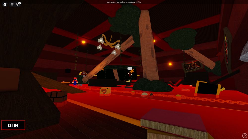 The cafe, similarly destroyed. A few trees grow through the walls and floor.
