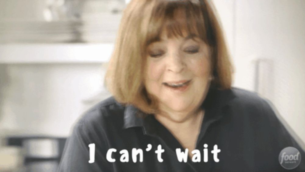 a woman says " i can 't wait " in front of a sign that says food network