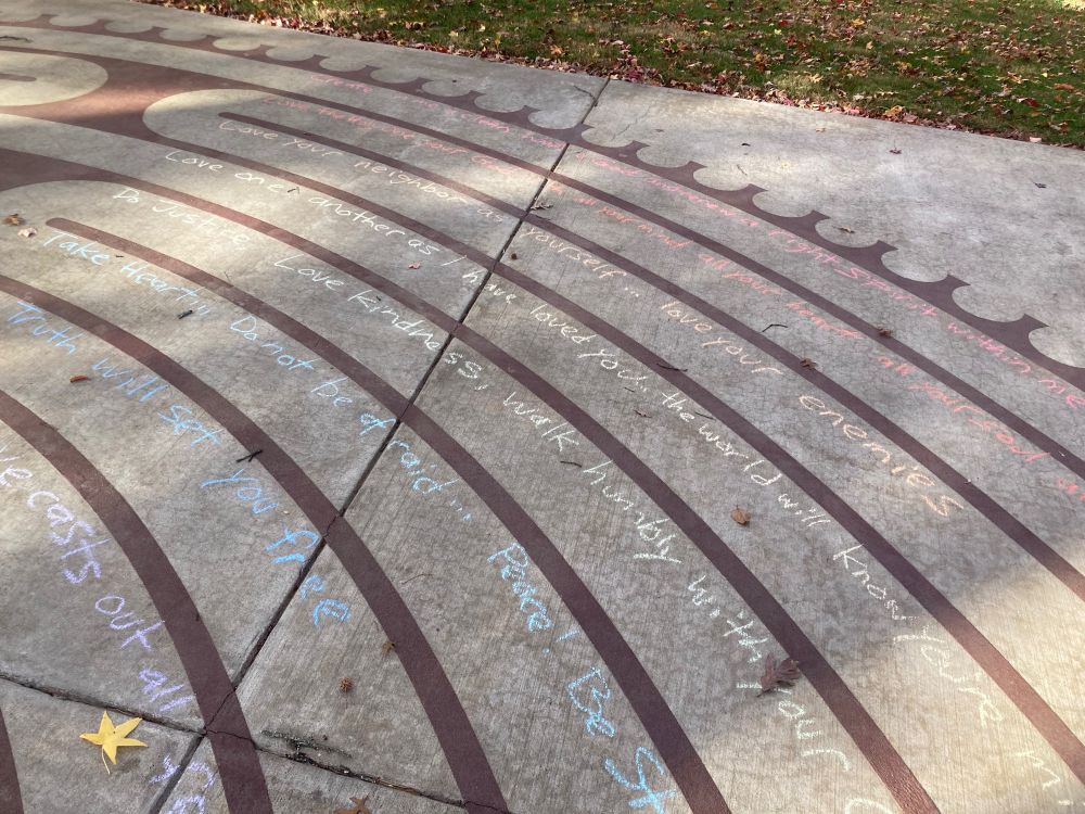 verses chalked in circuits of a walking labyrinth