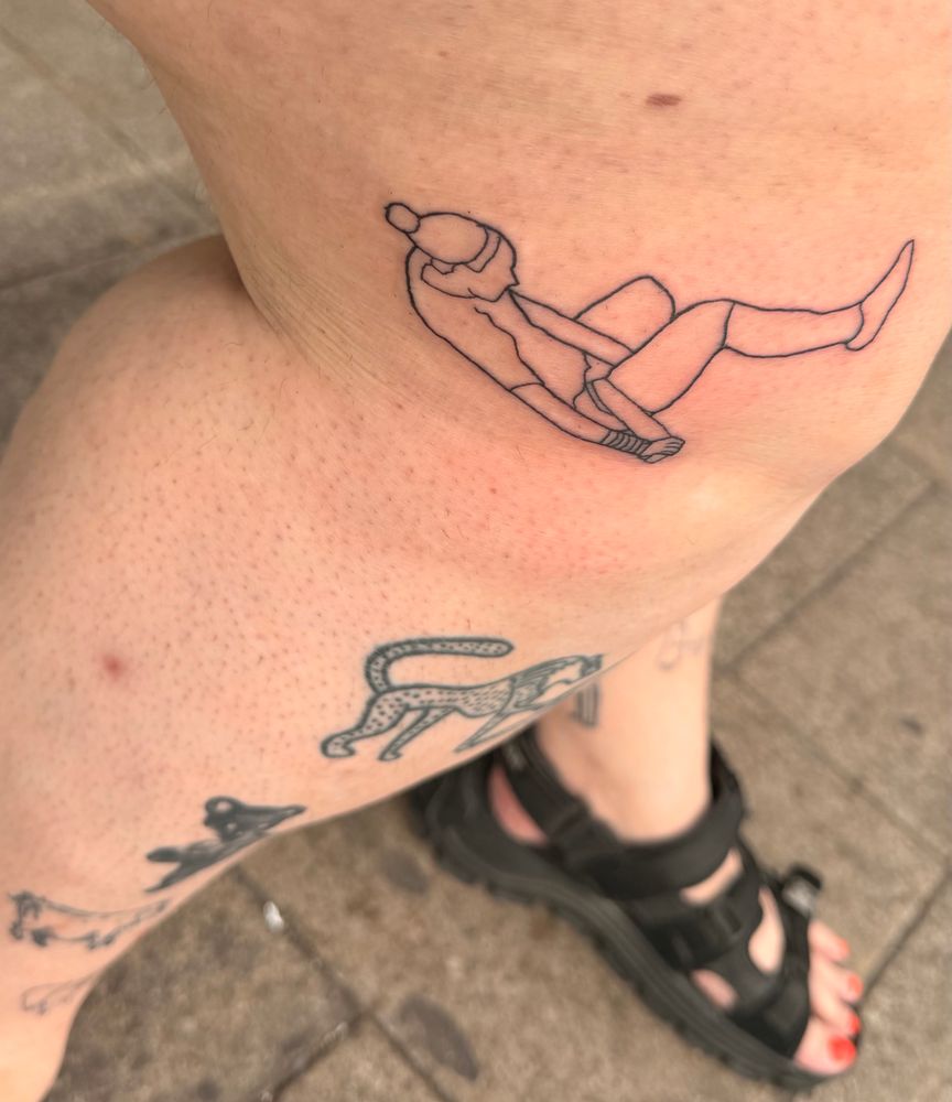 The posters leg on which there’s a tattoo of Lucy Bronze strapping up her thigh during the Euros. 