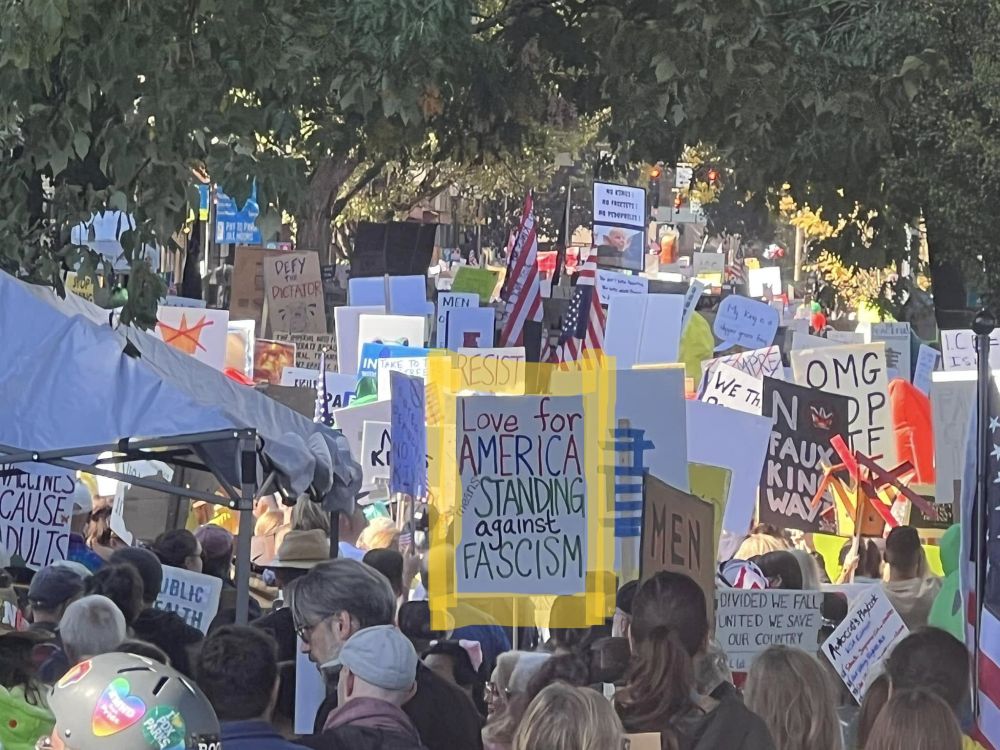 Portland, Oregon No Kings protest sign says: Love for America means Standing against Fascism 