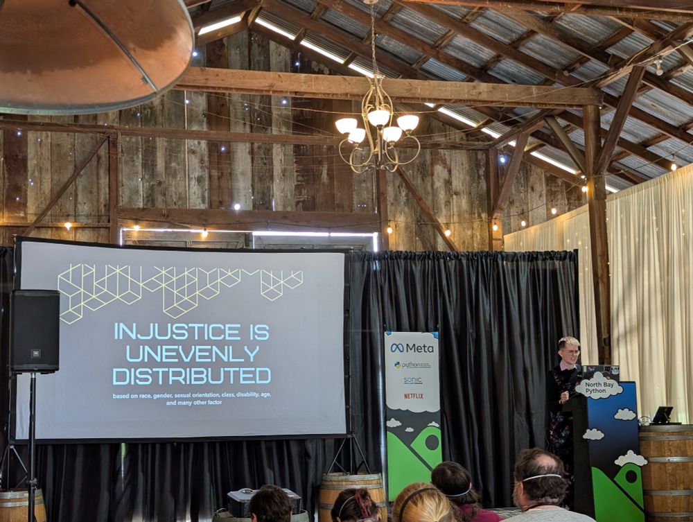 A photo of Tilde on stage beginning their presentation.