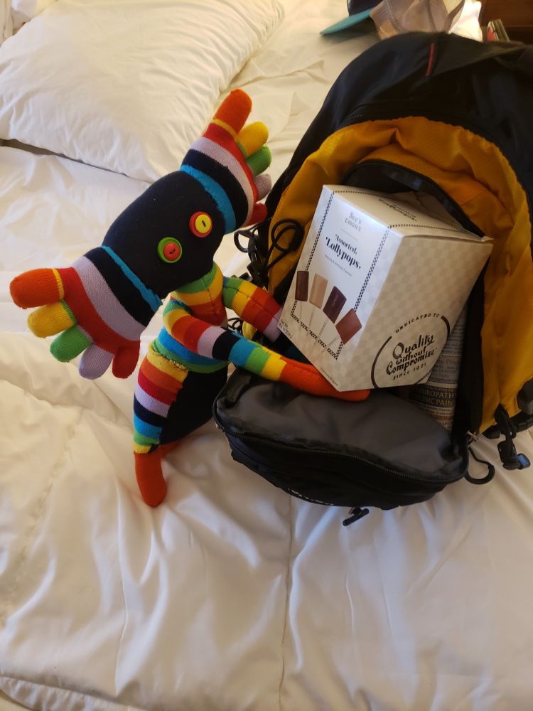 Zarzack the silent terror loads our chocolate lollipops into my backpack