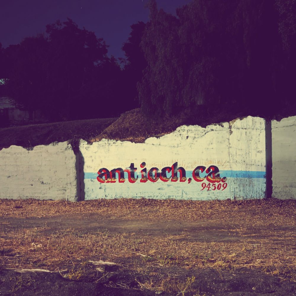 This is a mural showing the water and sky along with the words "antioch, ca. 94509", painted in an old concrete wall. Who maintains it? I've seen it get graffitied but restored within a day.