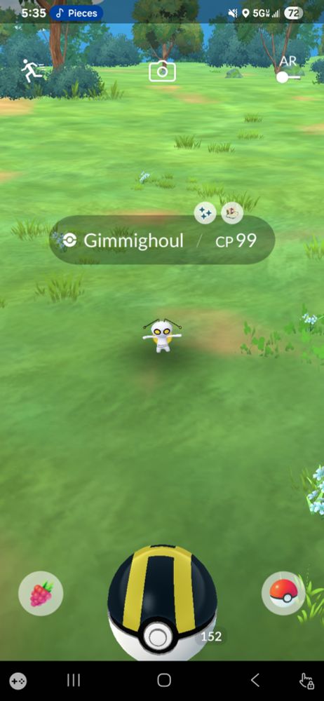 Shiny gimmighoul in pokemon go from a coin bag.