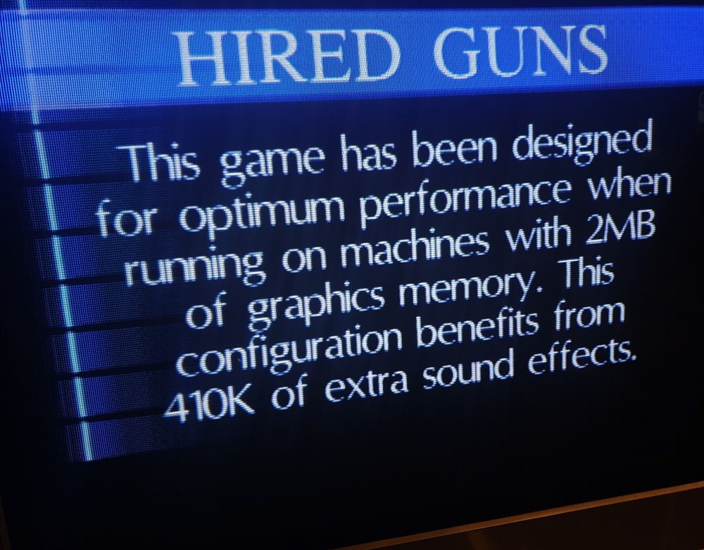 A snap of Hired Guns for Commodore Amiga running on a crt TV and reporting that has been designed for optimum performance running on machines with 2MB of graphics memory. This configuration benefits from 410K of extra sound effects. 