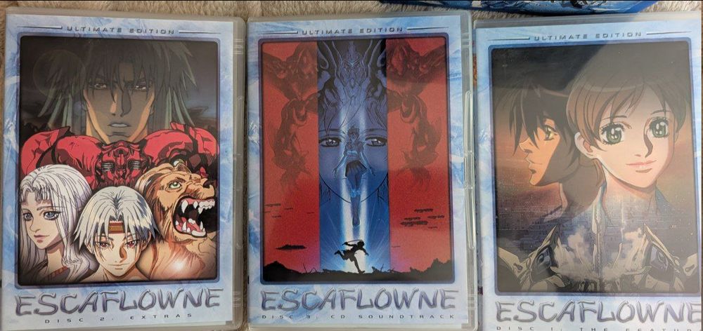 A shot of the 3 dvd cases with one being the movie, one being special features, and the other a soundtrack