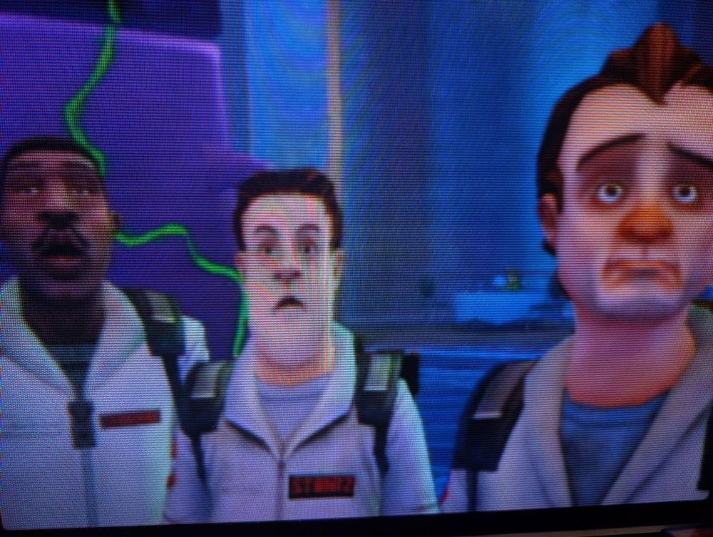 Peter, Ray, and Winston seen from the front staring up at something in disbelief 
