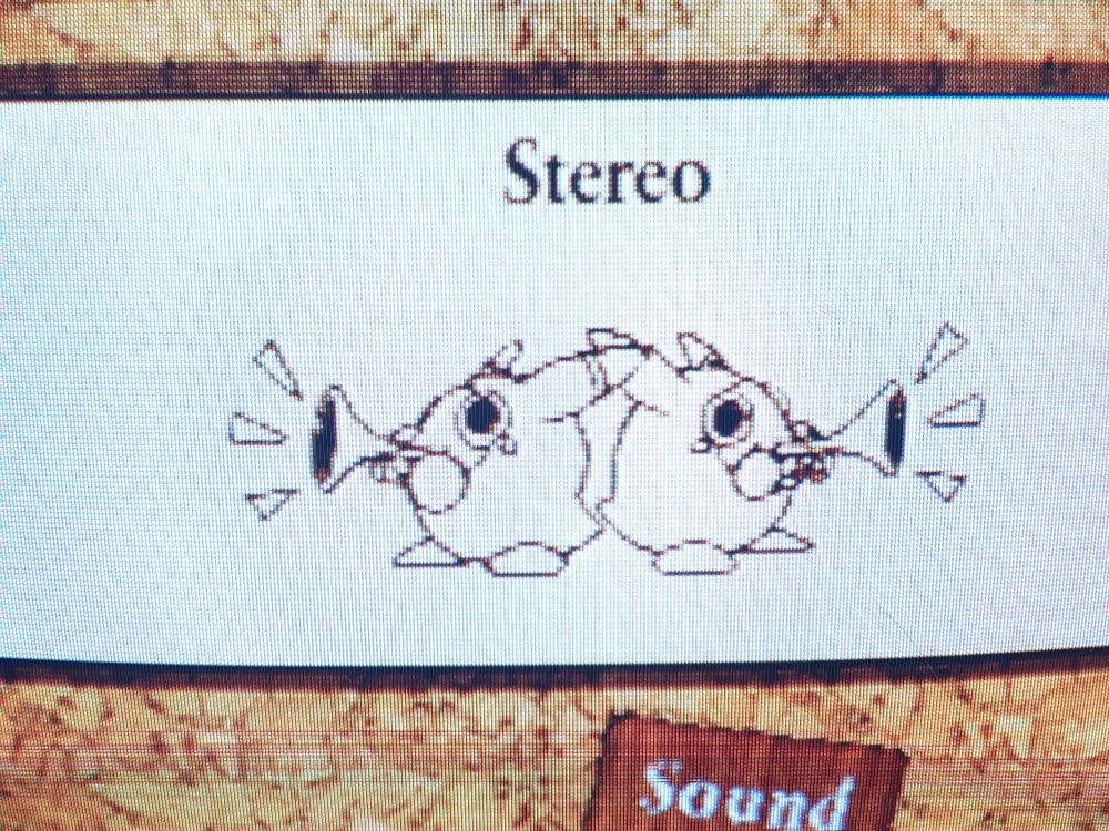 Stereo, with a pair of back to back bun ears blowing horns/trumpets 