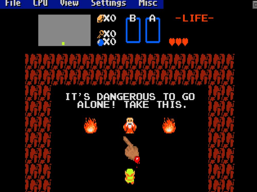 A snapshot of NESTICLE DOS running in Windows 3.1's DOS environment. Zelda 1 is running with the NESTICLE menu visible and the game on the 'it's dangerous to go alone! Take this' old man in cave screen. The bloody hand nesticle cursor has been placed over the sword that's usually there.