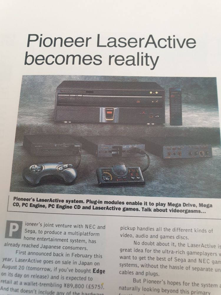 A photo of a page of EDGE's first issue, of an article about Pioneer's LaserActive multimedia system. ¥89,000 in 1993 currency, £575 without modules 