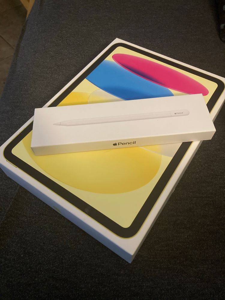 A photo a still packaged iPad and Apple Pencil 