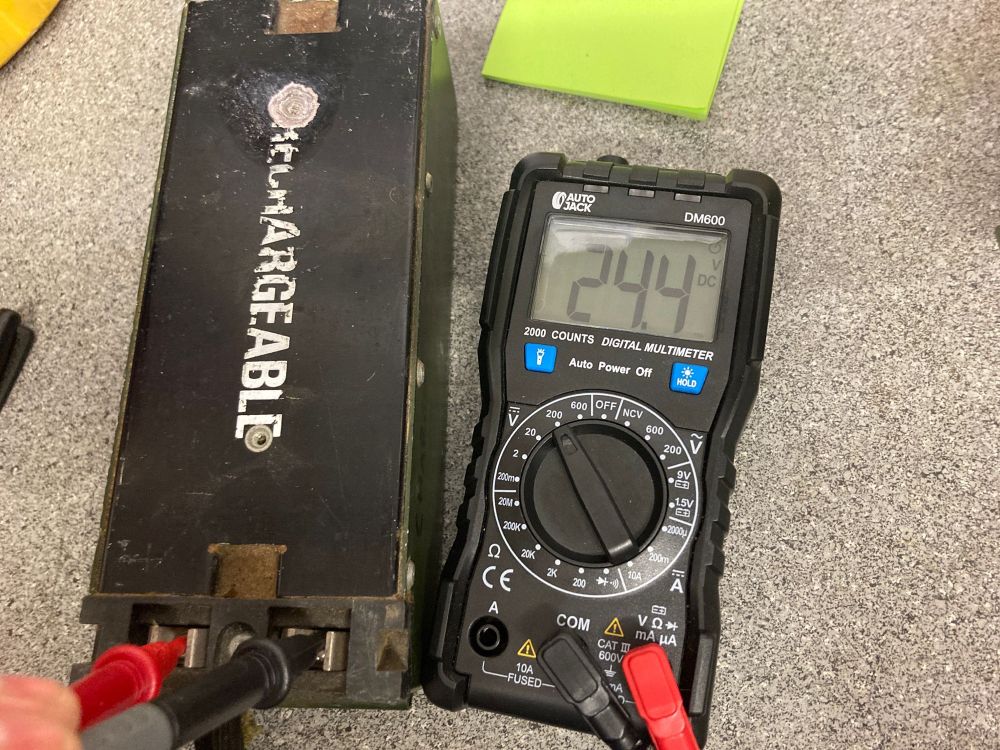46 year old battery with a reading of 24.4 volts 