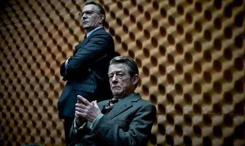 John Hurt starring as Control in Tinker Tailor Soldier Spy, sitting in a soundproofed room