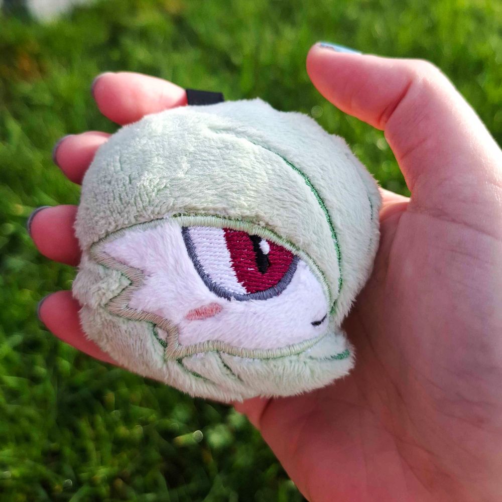 a handmade keychain of Gardevoir, from Pokemon