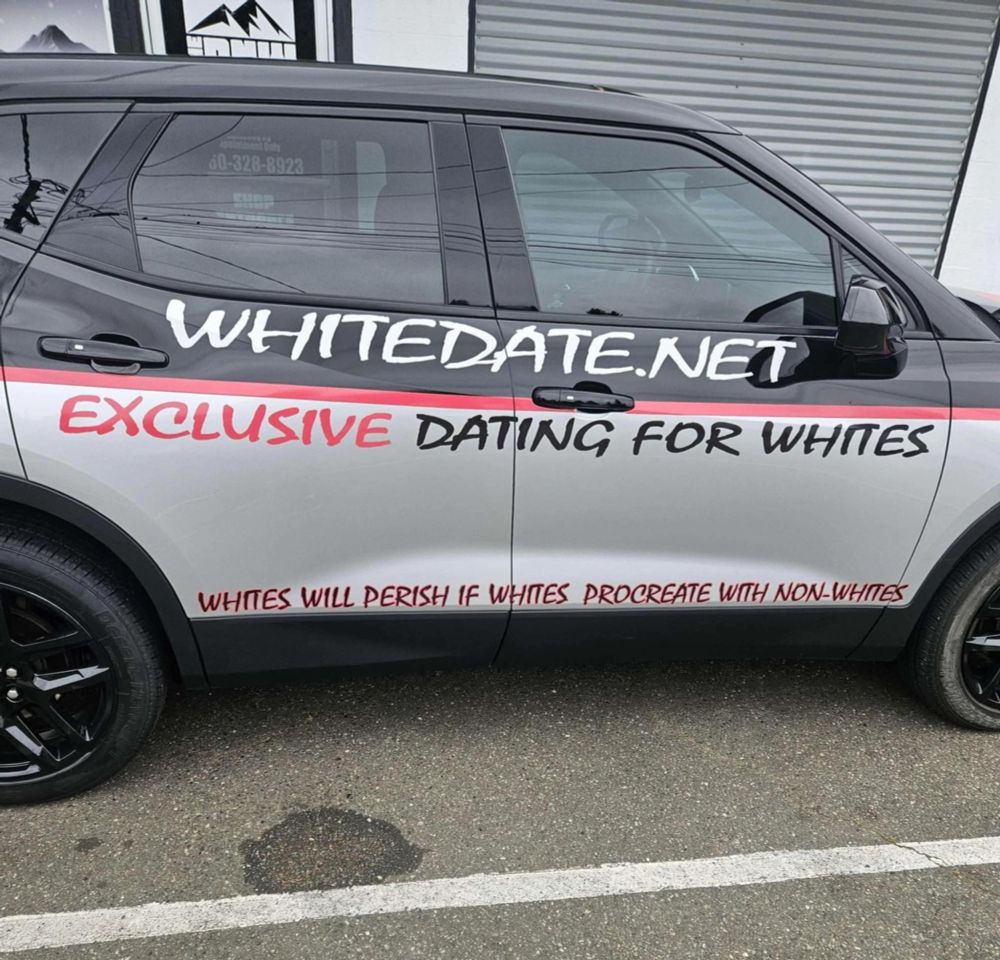A car that says:

whitedate.net
exclusive dating for whites
whites will perish if whites procreate with non-whites