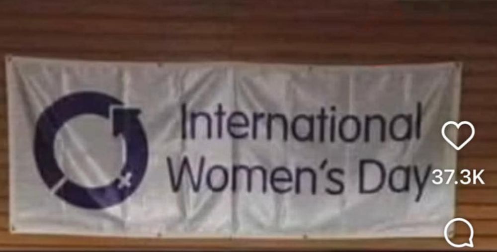 a banner that says international women's day