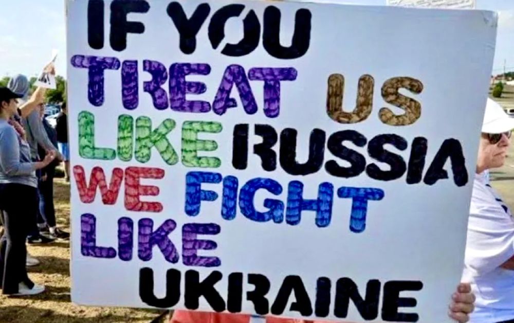 a sign that says

if you treat us like russia we fight like ukraine