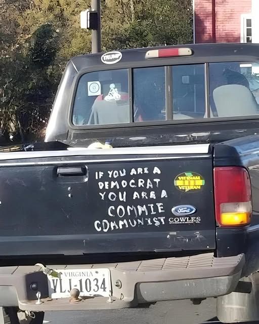 a truck that has this writing on the back of the truck - if you are a democrat you are a commie communist
