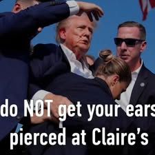 famous scene after trump got "shot in the ear" with secret service around him and "blood" smeared on this face

do NOT get your ears pierced at Claire's