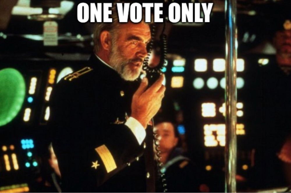 Screenshot of Sean Connery as Captain Marco Ramius in “The Hunt for Red October” with the words “One vote only” across the top of the image.