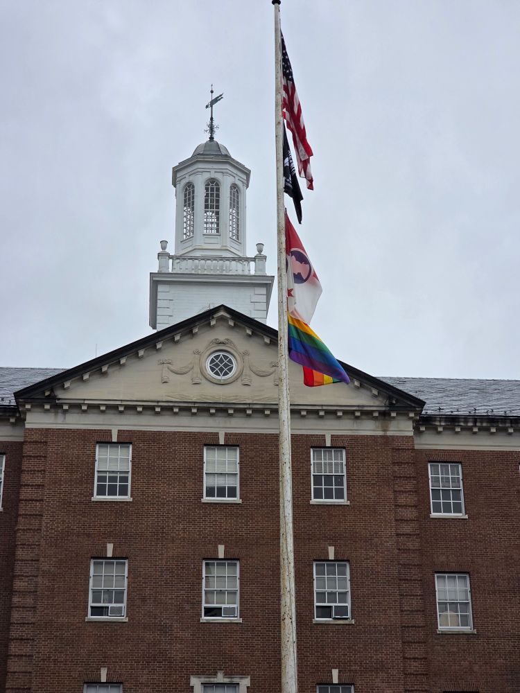 Morristown Municipal Building with flagpole. 