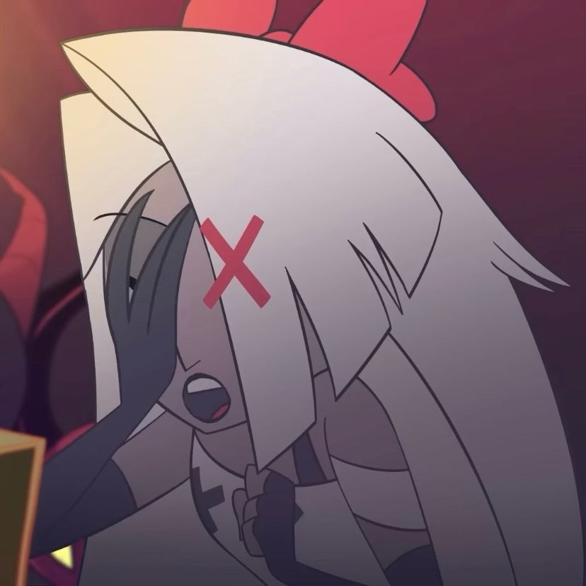 Screenshot from the Hazbin Hotel pilot of Vaggie facepalming due to Charlie singing at the news station. 
