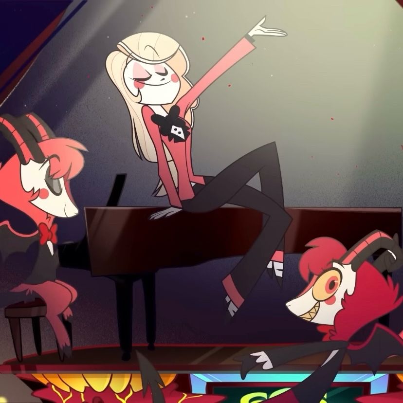 Screenshot of the Hazbin Hotel pilot, where Charlie is posing on the piano and about to sing at the news station. Dazzle and Dazzle are there for support. 