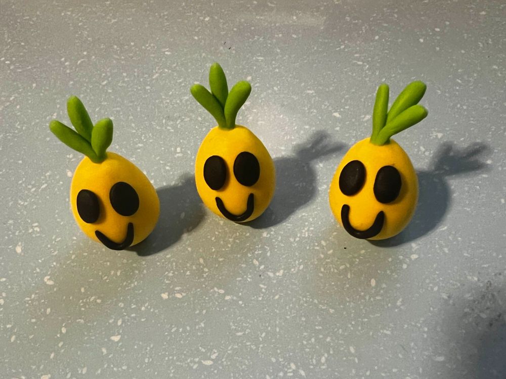 3 happy neggs from neopets.com made out of polymer clay