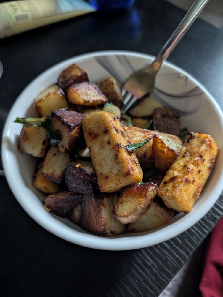 Southwestern Chipotle fried tofu potatoes and green onion. 