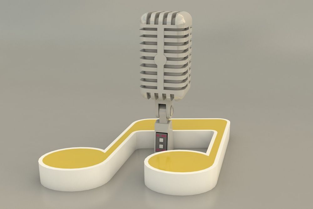 Old-style mic standing in a 3D musical note, by fernandozhiminaicela via Pixabay